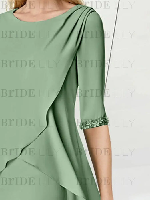 Close-up of the beaded sleeve cuff on the sage green chiffon dress