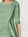 Close-up of the beaded sleeve cuff on the sage green chiffon dress