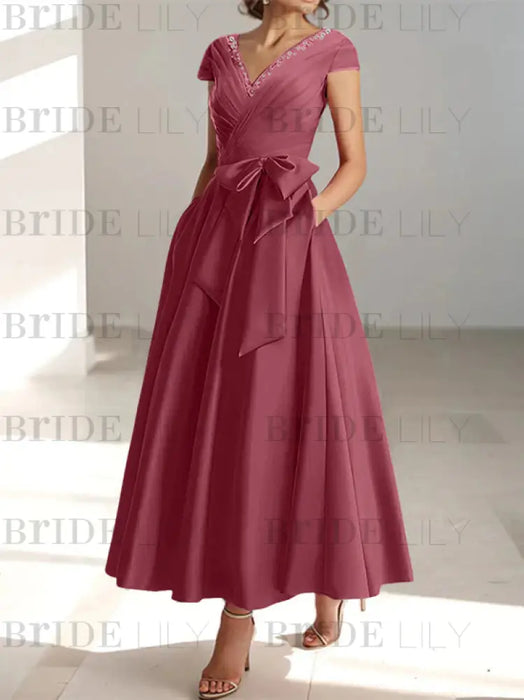 Cinnamon Rose satin mother of the bride tea length dress with bow and pockets