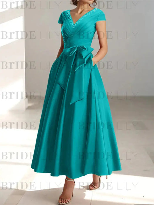 Emerald Green satin mother of the bride tea length dress with bow and pockets