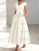 Ivory satin mother of the bride tea length dress with bow and pockets