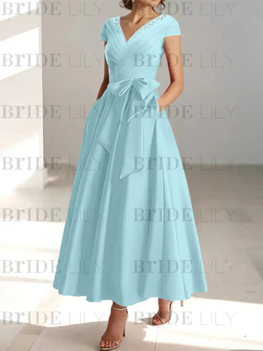 Mist Blue satin mother of the bride tea length dress with bow and pockets