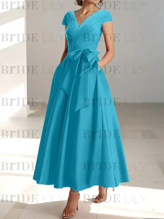 Ocean Blue satin mother of the bride tea length dress with bow and pockets