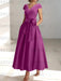 Orchid satin mother of the bride tea length dress with bow and pockets