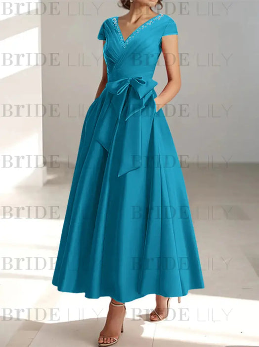 Pool satin mother of the bride tea length dress with bow and pockets