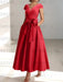 Red satin mother of the bride tea length dress with bow and pockets