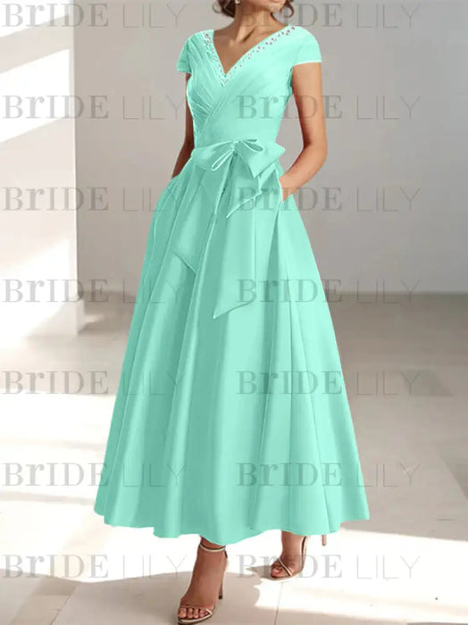 Spa satin mother of the bride tea length dress with bow and pockets