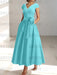 Turquoise satin tea length dress with a tie bow