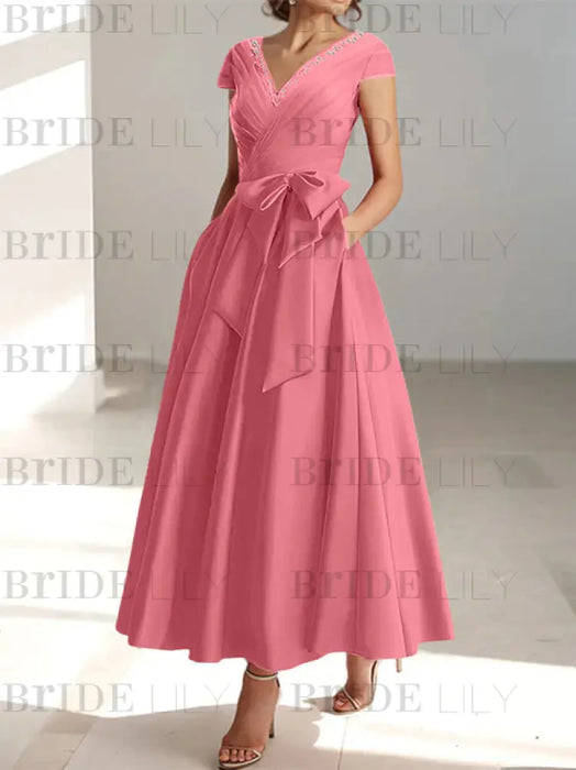 Watermelon satin mother of the bride tea length dress with bow and pockets