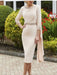 Nude pink crepe dress with a beaded neckline and cape panel