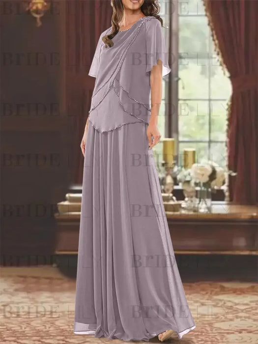 Lilac grey beaded chiffon overtop with a matching skirt
