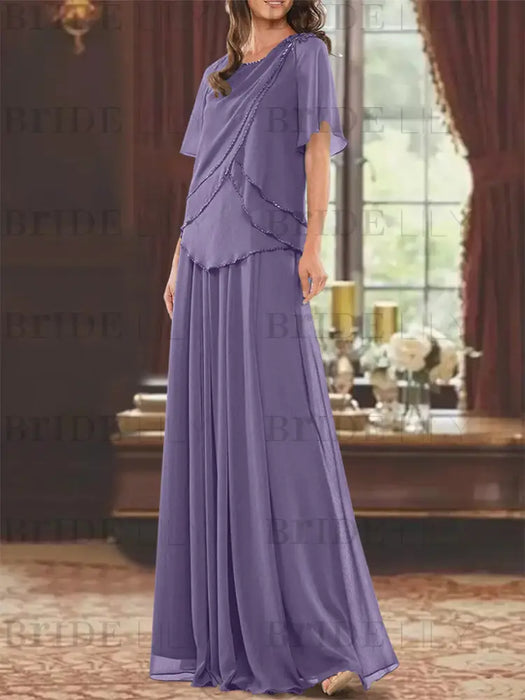 Purple beaded chiffon overtop with a matching floor-length skirt
