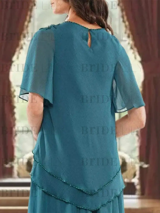 Close-up of the teal chiffon back with a keyhole opening
