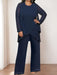Plus size navy chiffon pantsuit with a beaded tunic and jacket