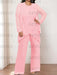 Plus size pink chiffon pantsuit with a beaded tunic and jacket