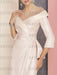 Close-up of the beaded waist ornament and surplice bodice in blush pink