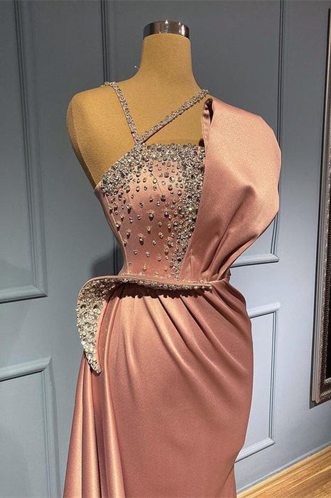 Blush Pink Mermaid Prom Gown with Delicate Ruffles and Sparkling Bead Embellishments