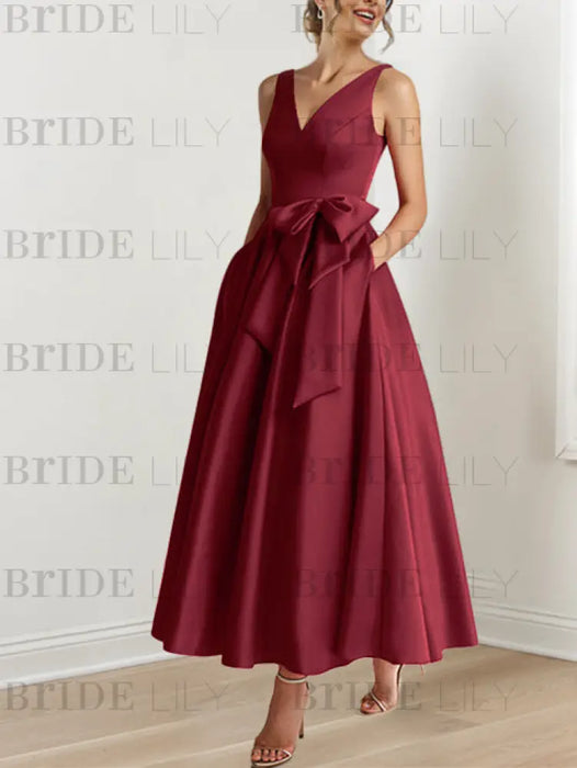 Burgundy satin mother of the bride ankle dress with bow sash and pockets