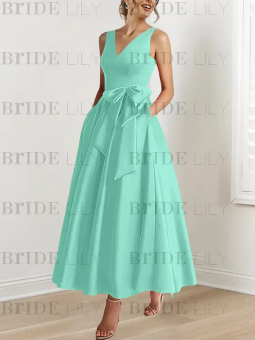 Spa satin mother of the bride ankle dress with bow sash and pockets