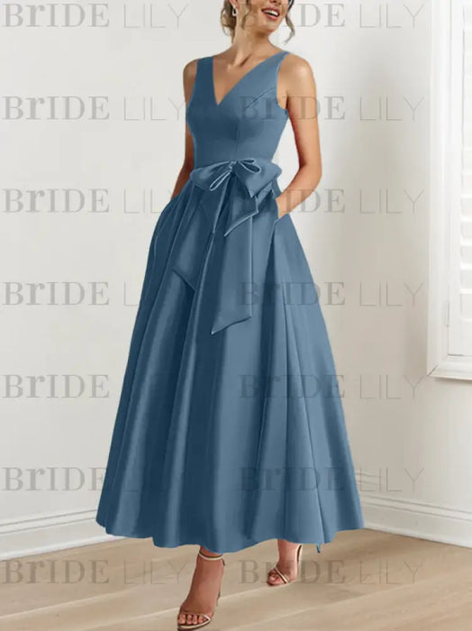 Steel blue satin ankle length dress with a bow sash