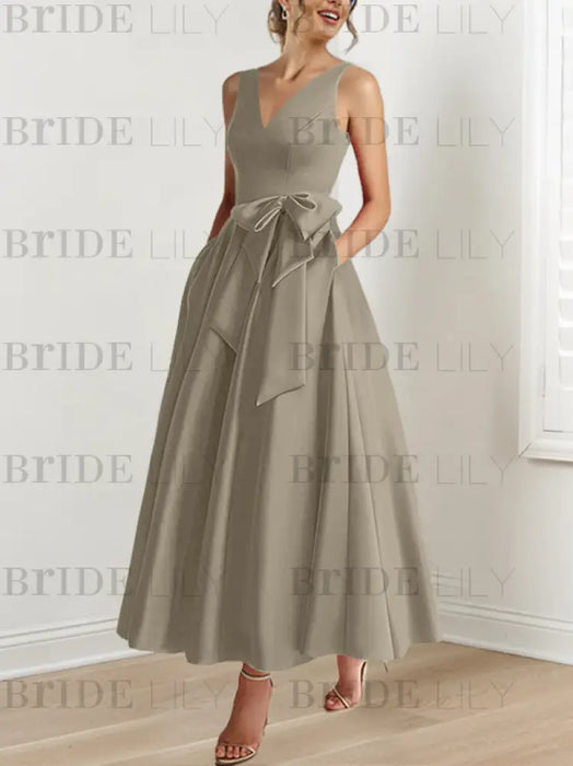 Taupe satin mother of the bride ankle dress with bow sash and pockets