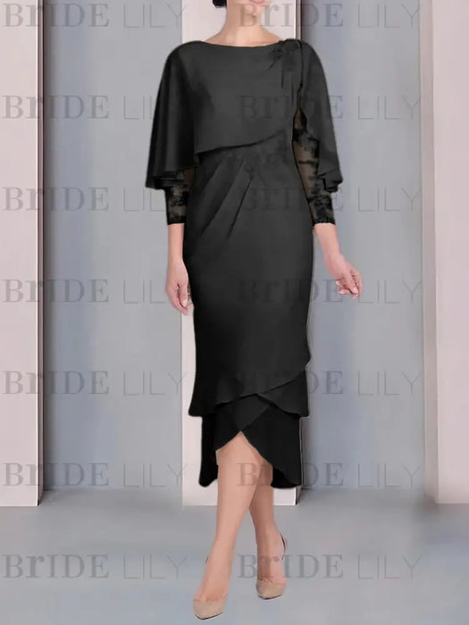 Black chiffon tea length dress with a cape overlay