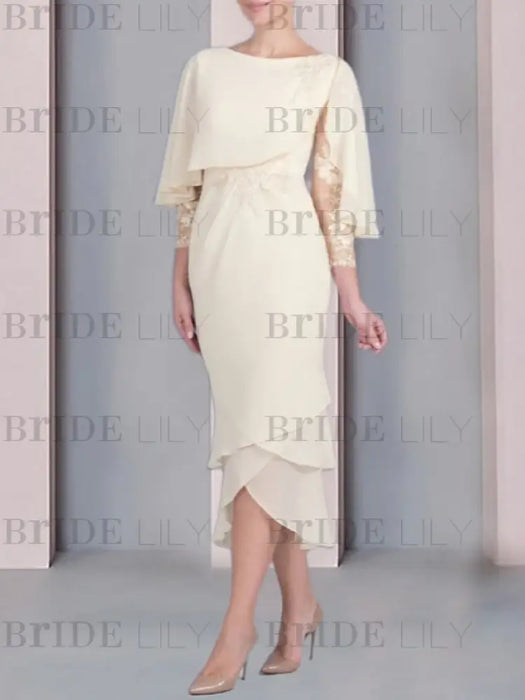 Ivory chiffon tea length dress with a cape overlay