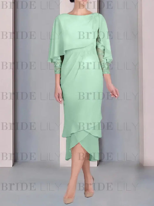Mint green chiffon tea length dress with a cape overlay