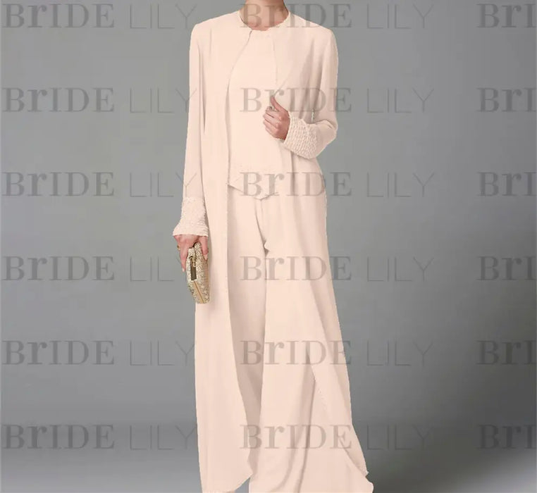 Chiffon three piece pantsuit with a long duster coat in ivory
