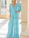 Blue chiffon mother of the bride jumpsuit with pockets and kimono sleeves