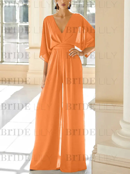 Orange chiffon mother of the bride jumpsuit with pockets and kimono sleeves