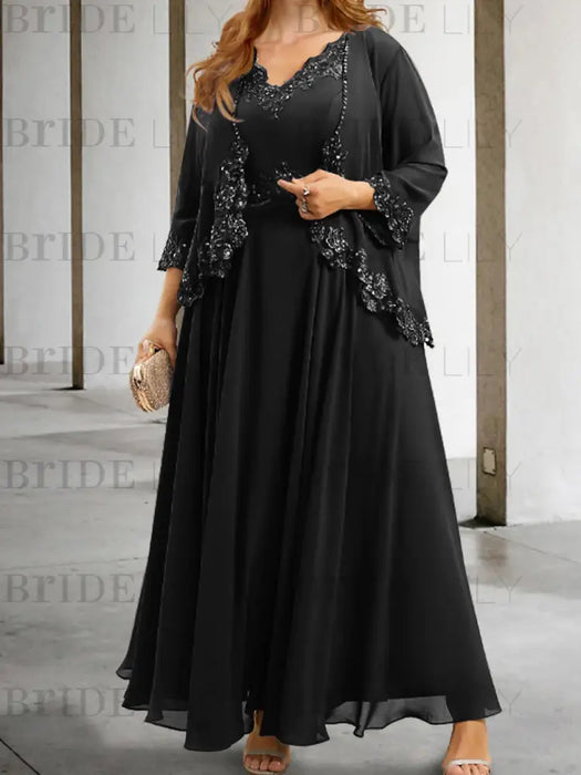 Chiffon A-line dress with a sequin lace trimmed jacket in black