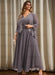 Grey mauve chiffon dress and lace trimmed jacket in warm light