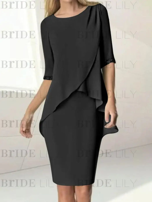 Chiffon overlay knee length dress with beaded cuffs in black