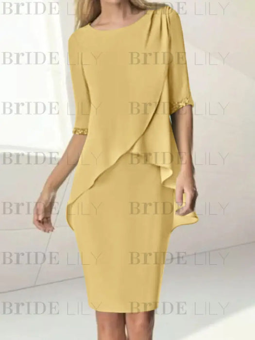 Gold chiffon overlay mother of the bride knee length dress with beading