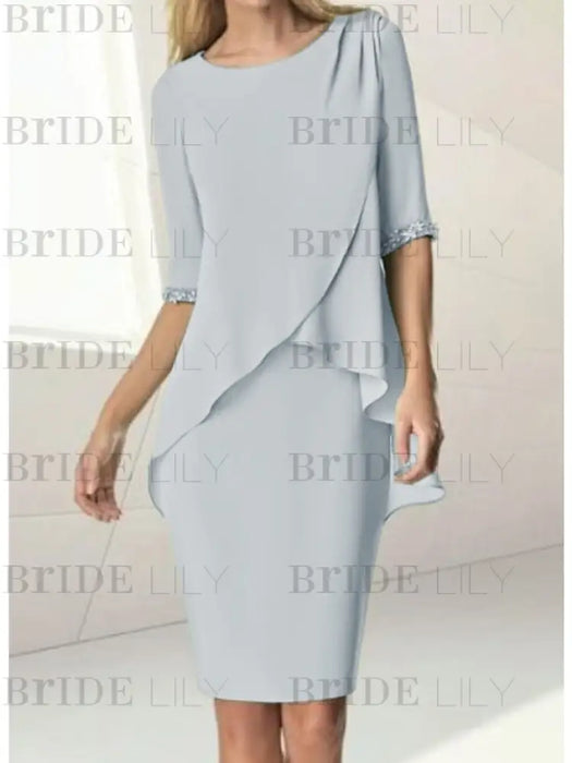 Chiffon overlay knee length dress with beaded cuffs in pale grey
