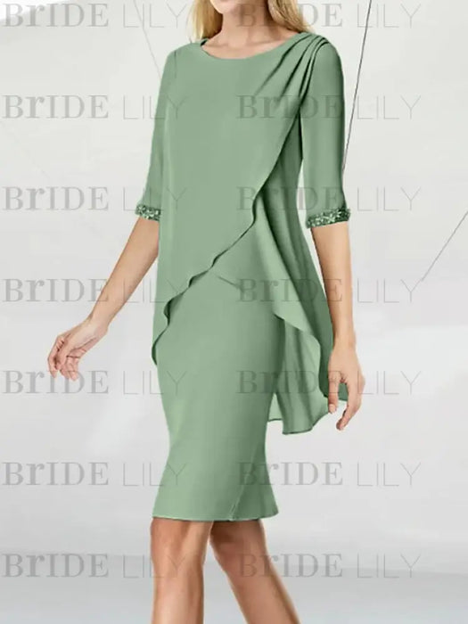 Side view of the sage green chiffon overlay knee length dress