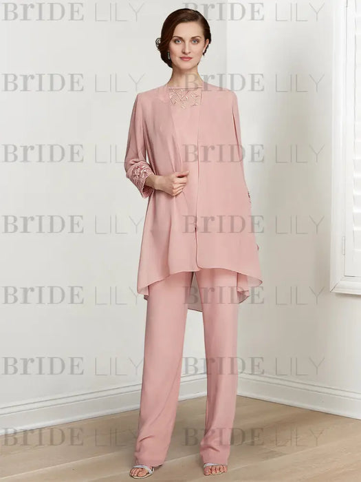 Full length view of the blush pink chiffon three piece pantsuit