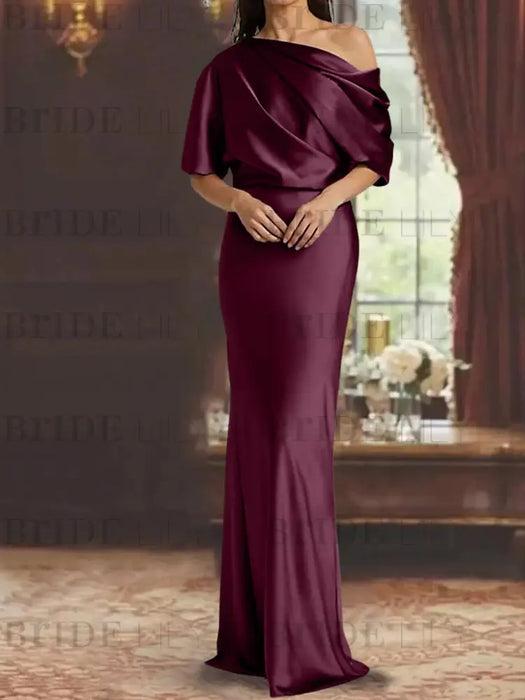 Draped satin column gown with a blouson top in burgundy
