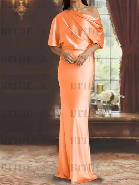 Orange draped satin mother of the bride column gown with blouson top