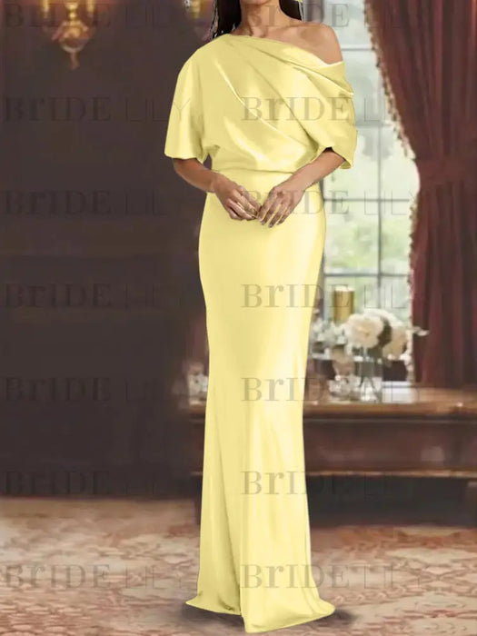 Yellow draped satin mother of the bride column gown with blouson top