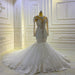 Elegant Long-Sleeve Pearl Sequin Bateau Mermaid Bridal Gown with Lace Beading