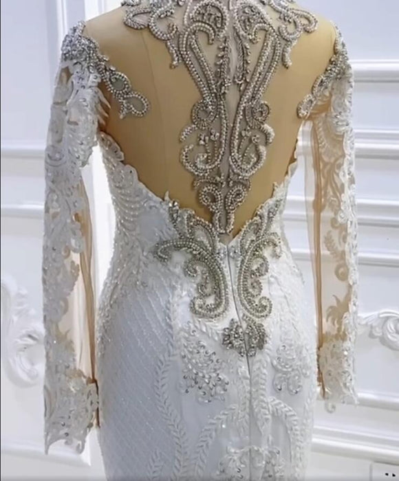 Elegant Long-Sleeve Pearl Sequin Bateau Mermaid Bridal Gown with Lace Beading