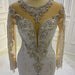 Elegant Long-Sleeve Pearl Sequin Bateau Mermaid Bridal Gown with Lace Beading