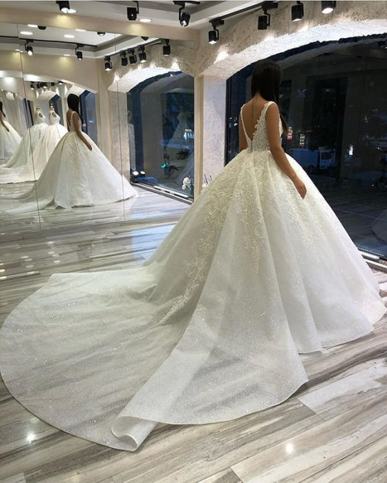 Miabel Elegant Sweetheart Wedding Dress with Sequins, Spaghetti Straps, and Backless Ball Gown Featuring Appliques Lace