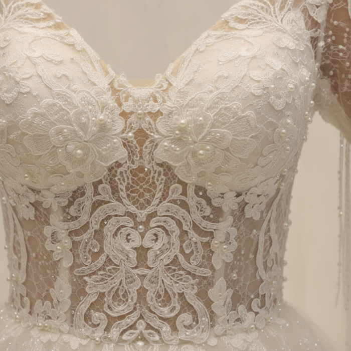 Elegant Short-Sleeve Backless A-Line Wedding Gown with Deep V-Neck, Lace Appliques, and Pearls