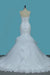 Elegant Spaghetti-Straps Mermaid Wedding Dress in Tulle with Backless Design and Lace Appliques