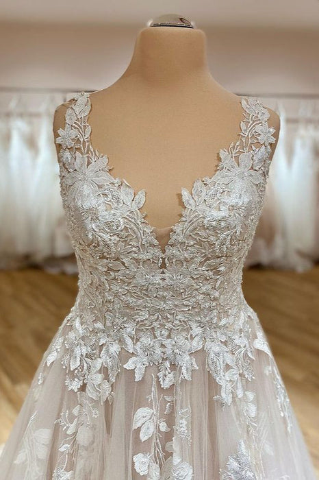 Elegant Sweetheart A-Line Wedding Gown with Lace Appliques and Tulle Ruffles
