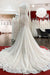 Elegant Sweetheart Mermaid Lace Bridal Gown with Long Sleeves and Tulle
