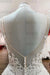 Elegant Long A-line Wedding Dress with V-neck, Spaghetti Straps, and Lace Ruffles
